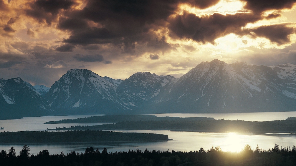 overcast with sun view of Grand Teton National Park in Jackson Hole