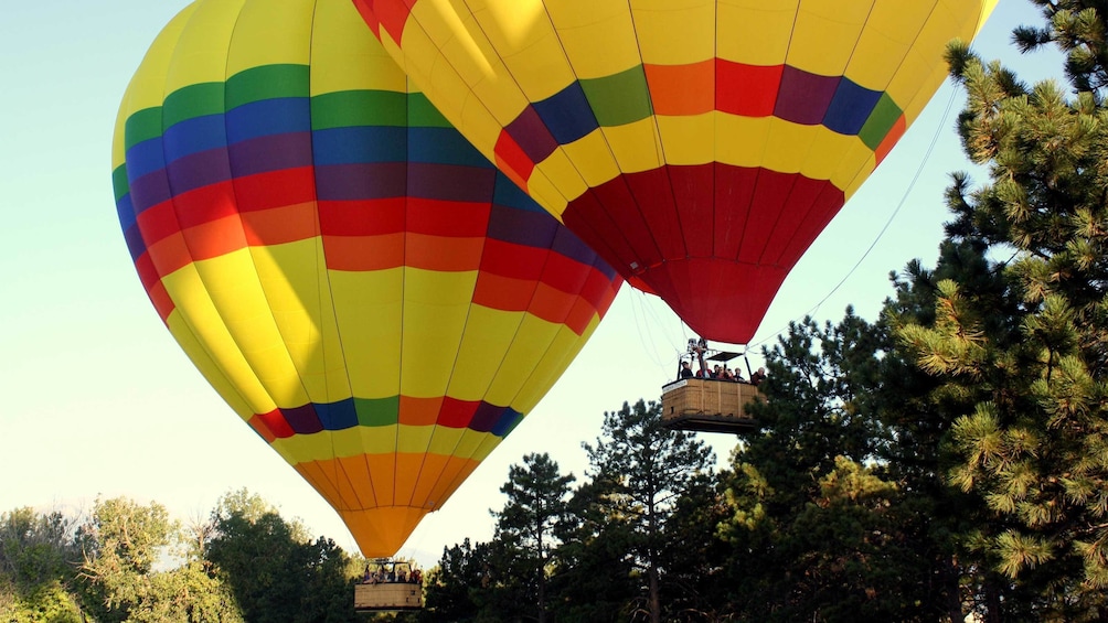 Two hot air balloons ascending