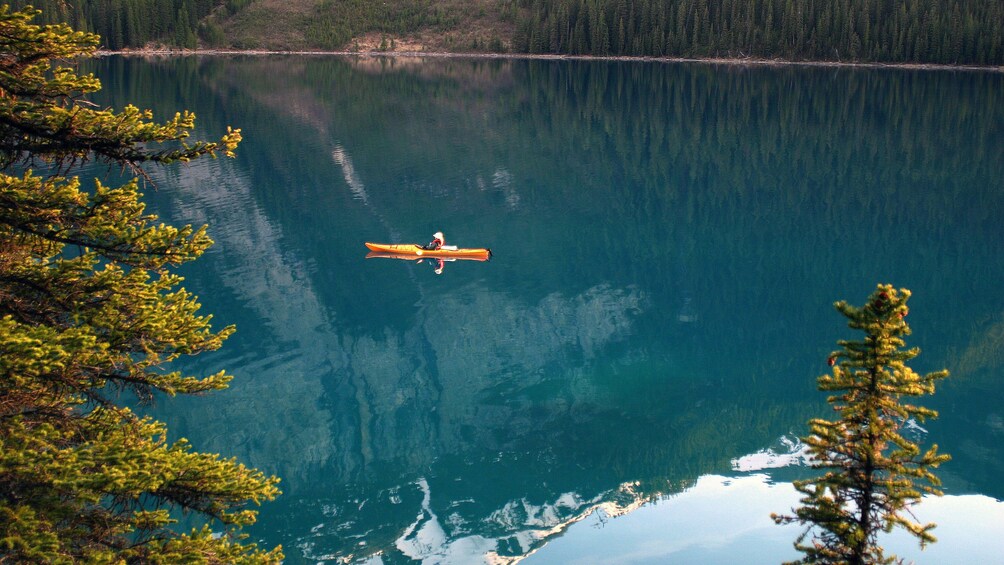 Kayaker paddling on Medicine Lake