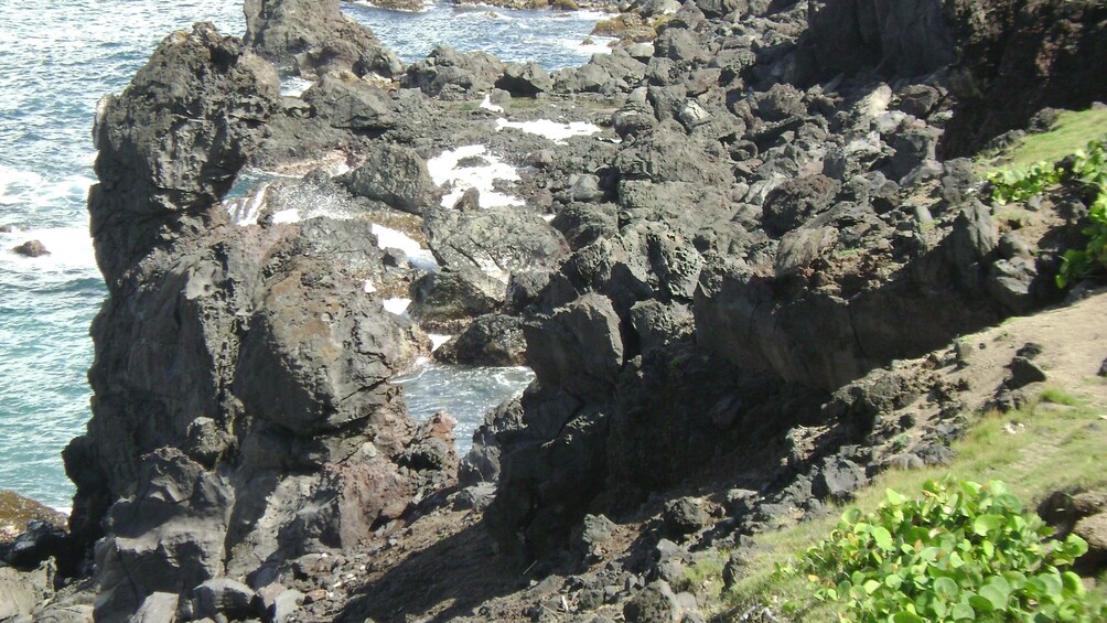 Large rocks and tide pools along the coast in St Kitts