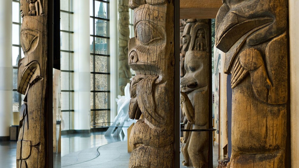Show item 1 of 10. Large totem poles in the Grand Hall at the Canadian Museum of Civilization in Ottawa