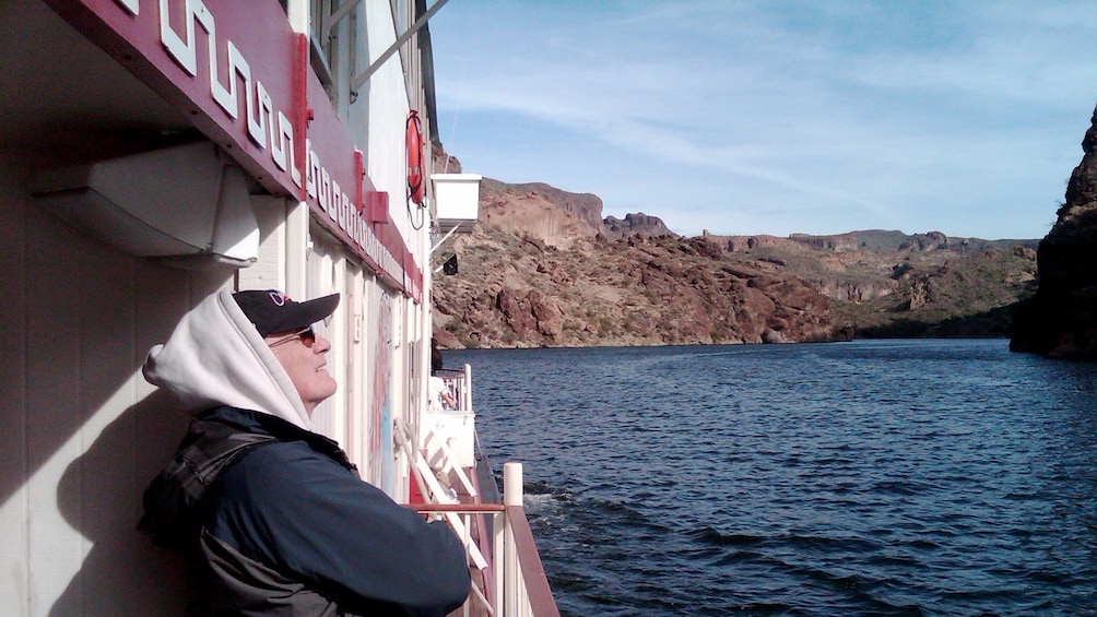 Gentleman enjoying the scenic view from the Dolly steamboat on the Apache Trail in Arizona
