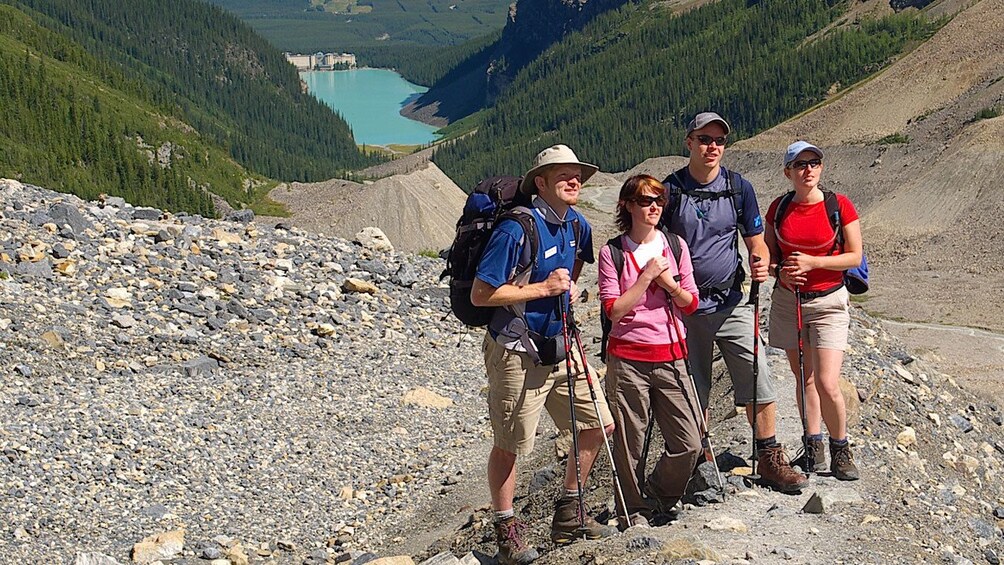 Group enjoy the scenery surrounding Lake Agnes