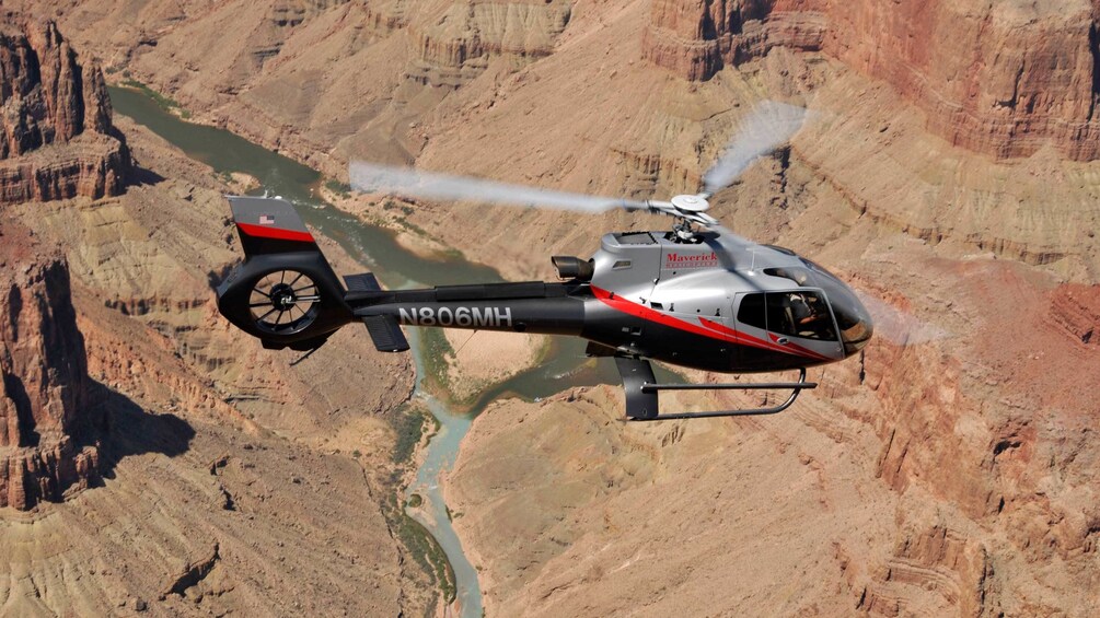 Close view of helicopter flying over the Grand Canyon