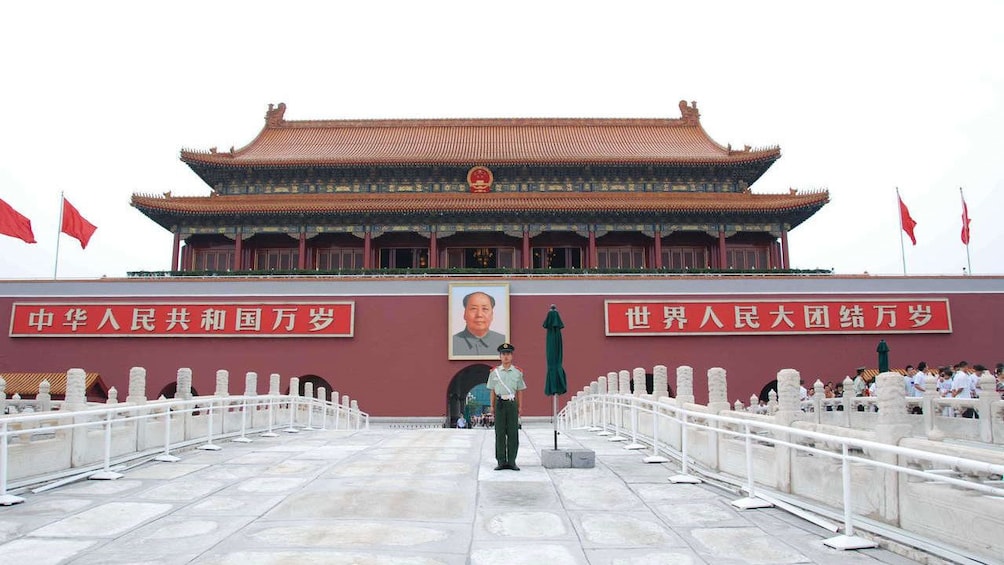 Guard standing at the entrance of Tiananmen Square in Beijing