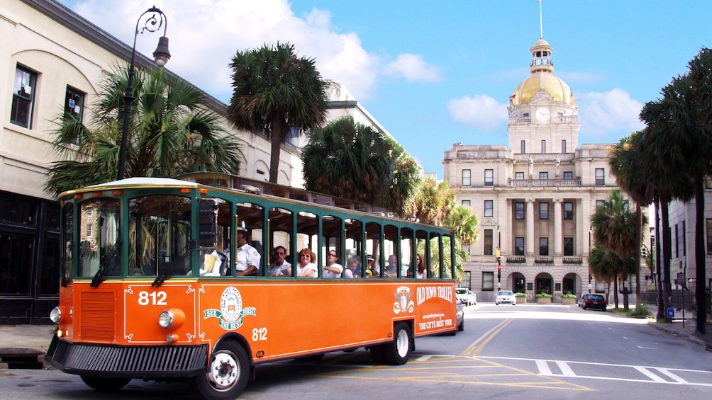 Old town trolley touring the historic district of Savannah