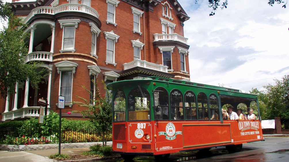 Hop on, hop off trolley going through downtown Savannah