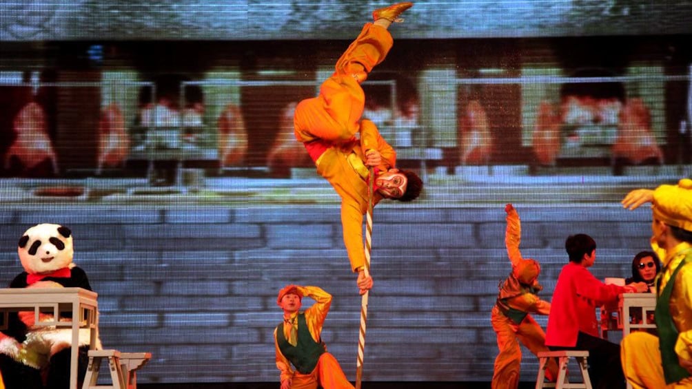 Show item 5 of 10. Performing kung fu on stage in Beijing