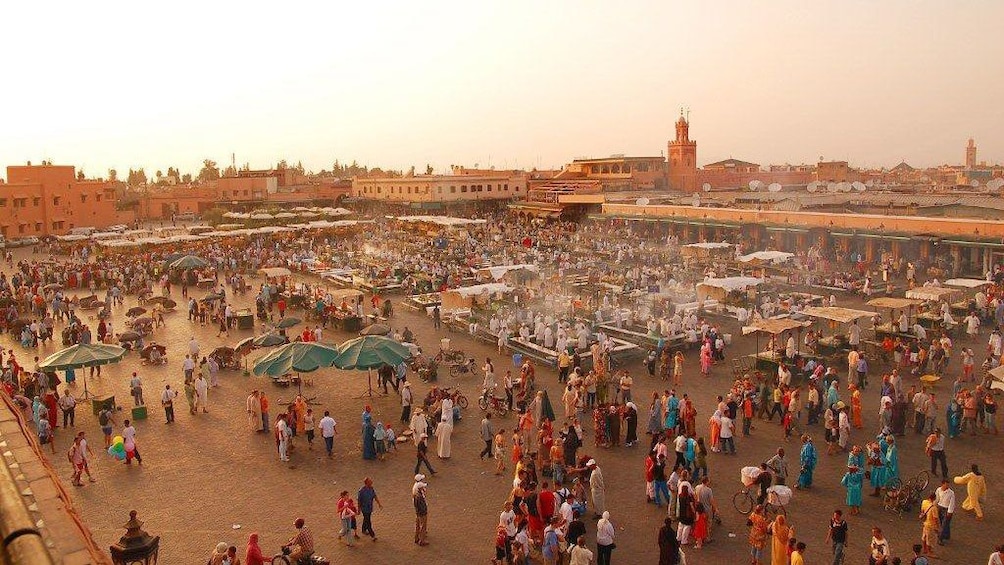 Crowded open-air marketplace in Marrakech