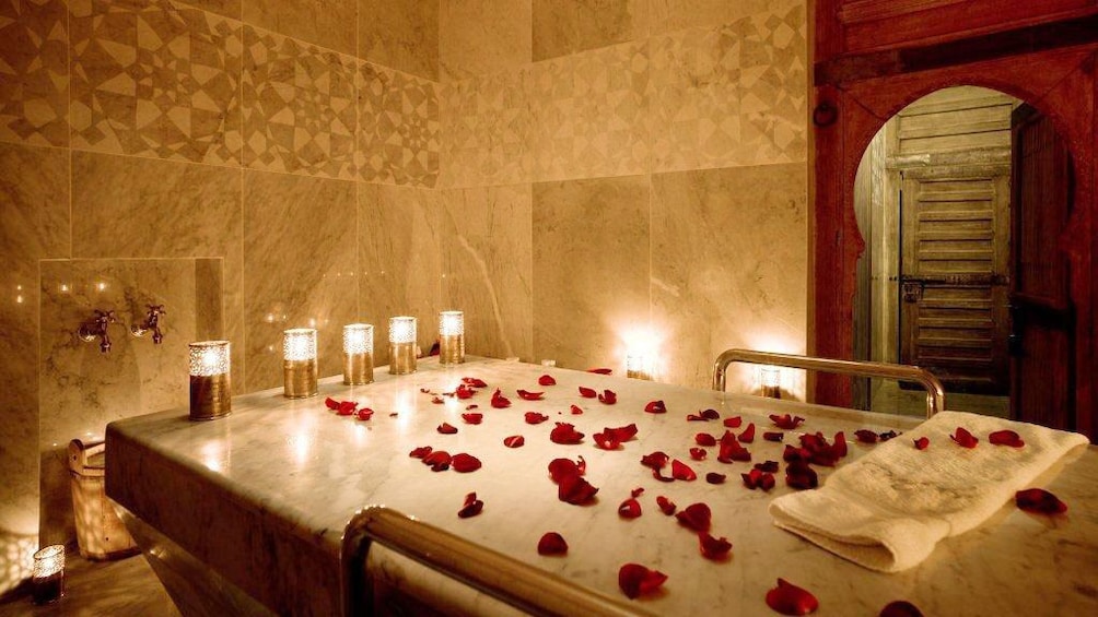 Rose petals on a table at a spa in Marrakech