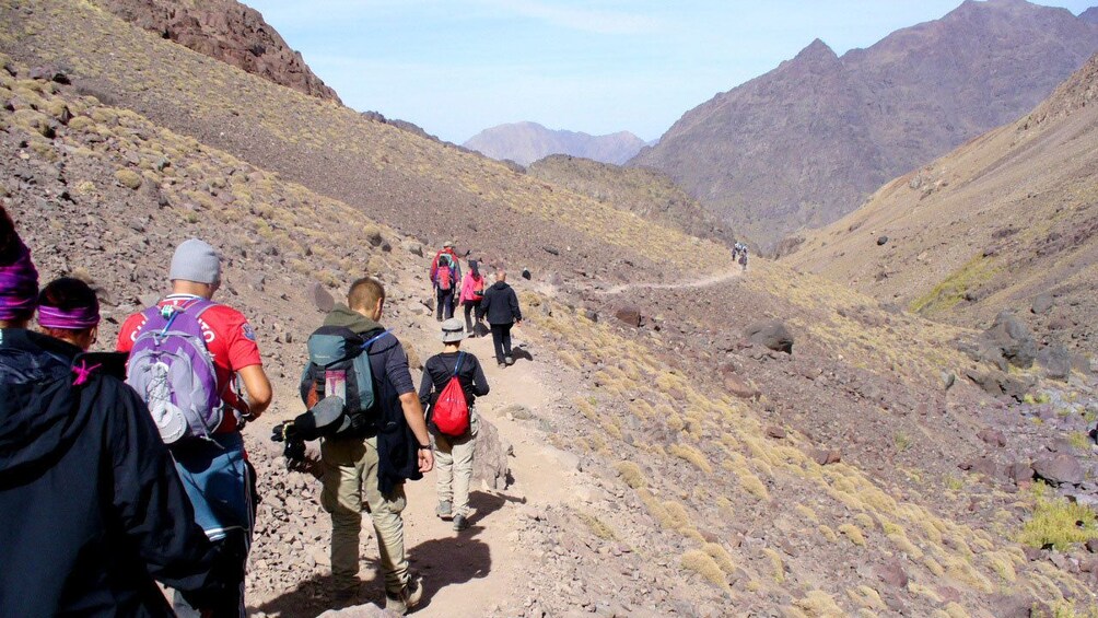 Hiking group on a trail in the Atlas Mountains in Marrakech