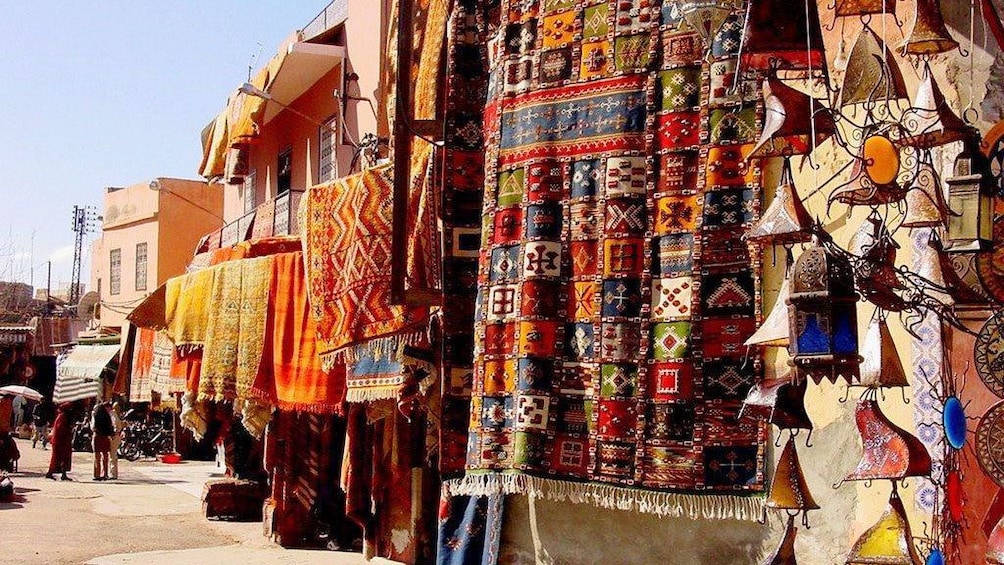 Colorful rugs for sale at a market in Marrakech