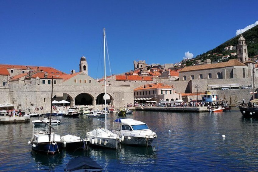 The old harbour - once upon a time it was the center of Ragusan commerce. Learn how important seafaring was for Dubrovnik from your local guide