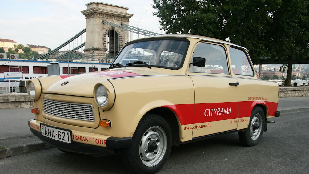 A Trabant Car parked on the side of the road in Budapest 