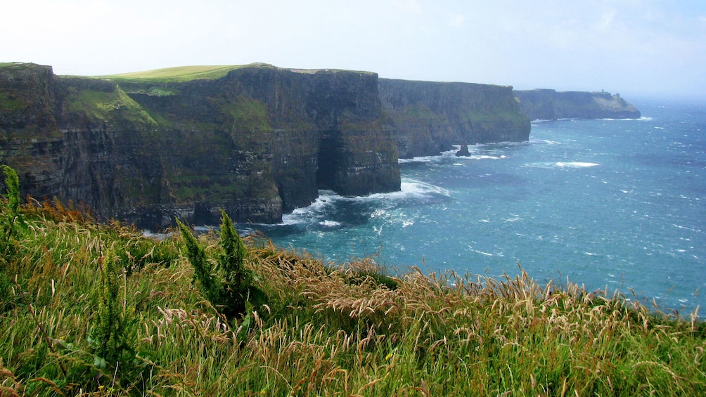 Show item 3 of 5. sea caves on the cliffs of Dublin bay