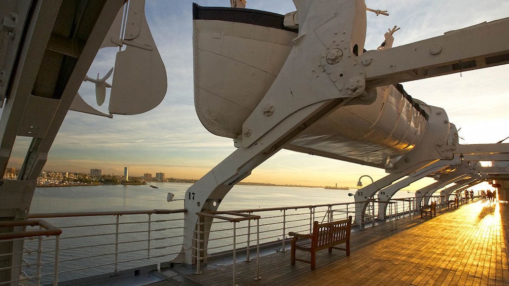 Show item 5 of 5. Deck and lifeboats onboard the Queen Mary.