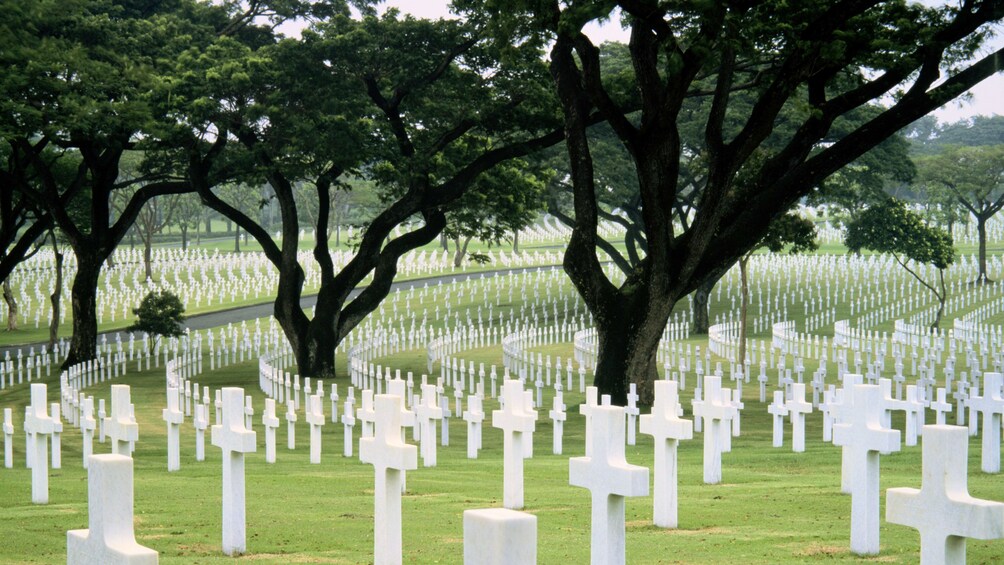 Crosses mark the graves at the American Cemetery in Manila