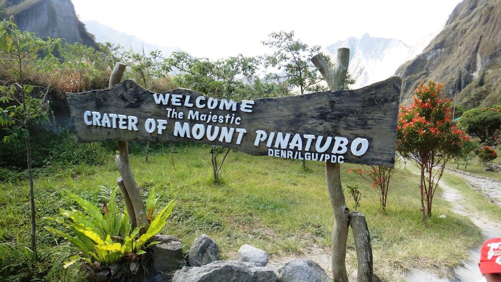 Wooden sign marking the crater of Mount Pinatubo