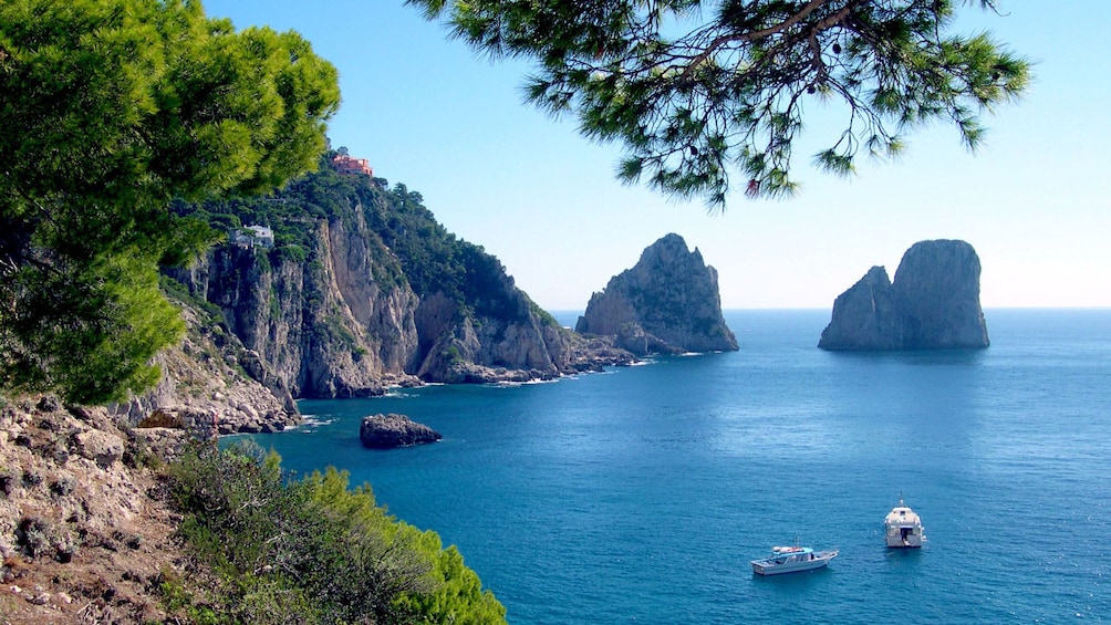 Cliffs and large rock formations jutting out of the sea on the island of Capri