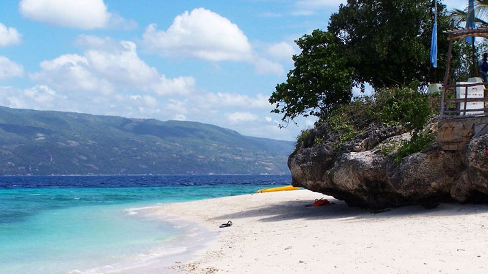 Sunny view of the beach and sand on Sumilon Island in the Philippines
