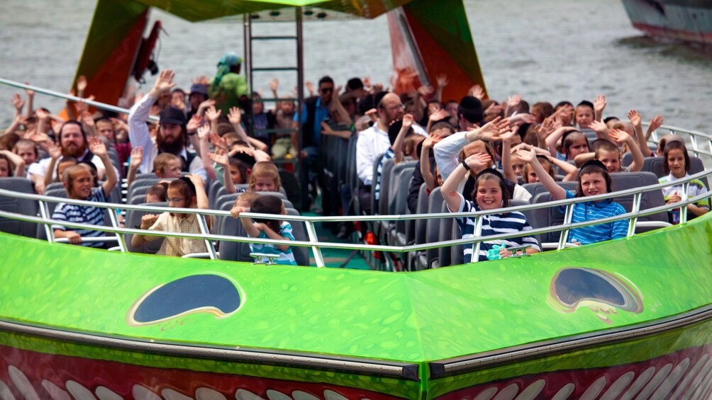 Boat riding passengers on the Beast Speedboat in New York