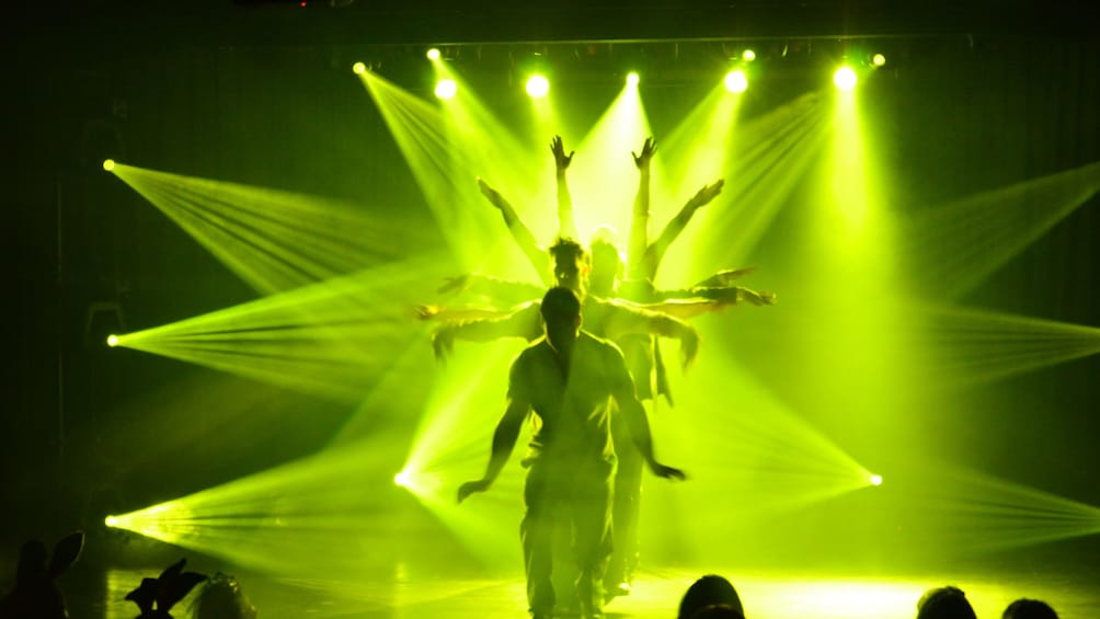 Thunder from down under performers fill the stage at the Excalibur Hotel and Casino