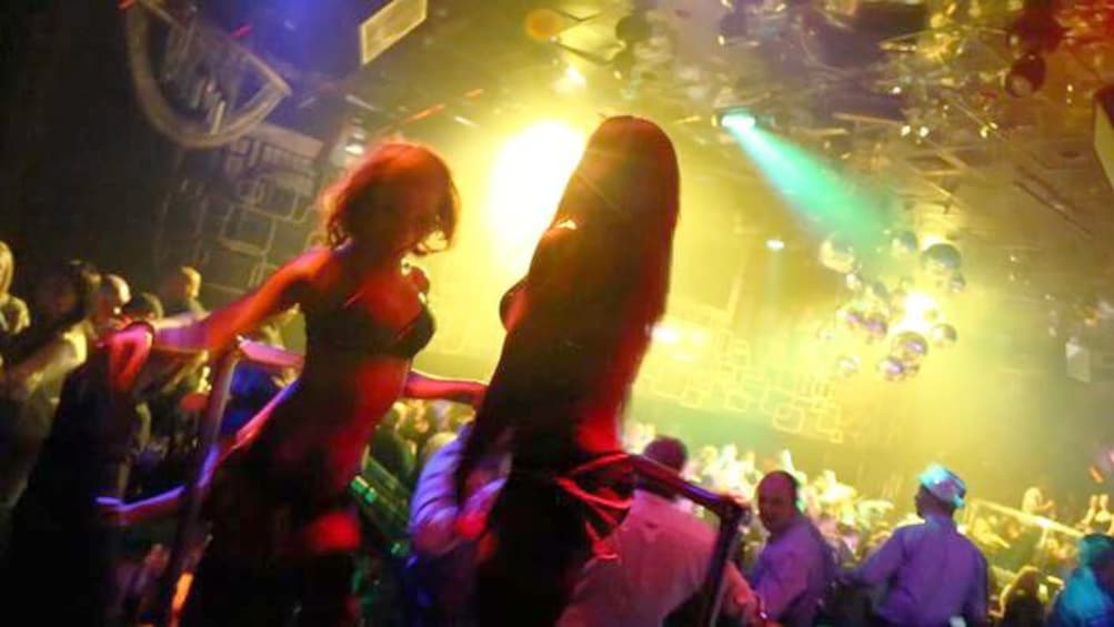 Two girls dancing inside a club in Las Vegas
