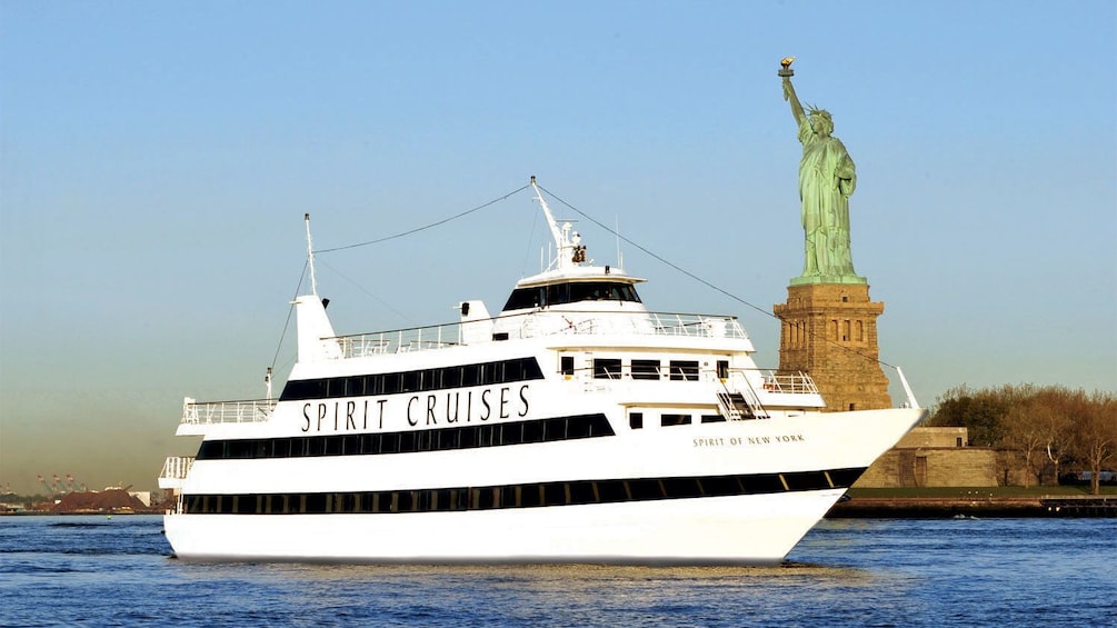 Cruise boat near the Statue of Liberty in New York