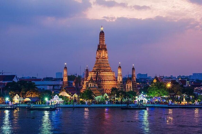 View the historical landmarks on a river cruise along the Chao Phraya river
