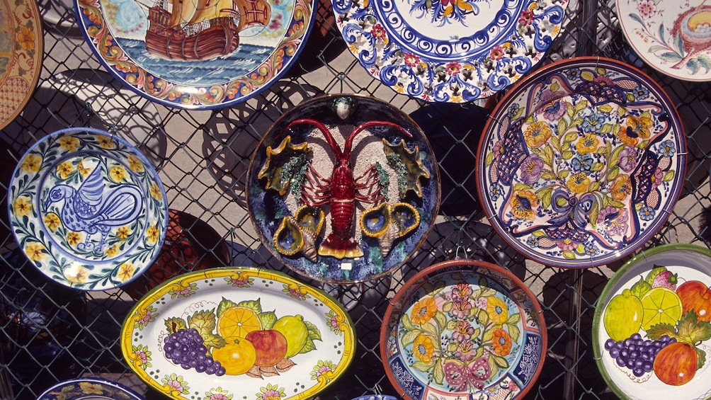 Colorful ceramic dishes for sale at the Loule outdoor marget in Loule