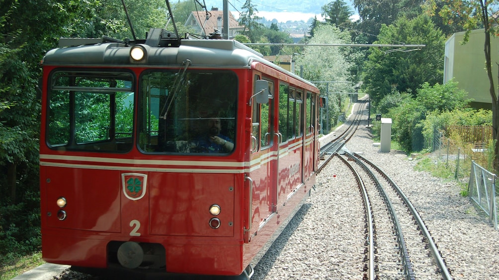 Indlæs billede 3 af 8. Red train in zurich