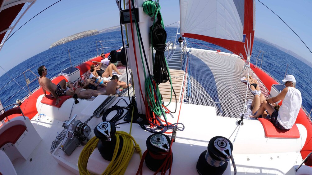 Aerial view of passengers onboard a boat in Santorini 