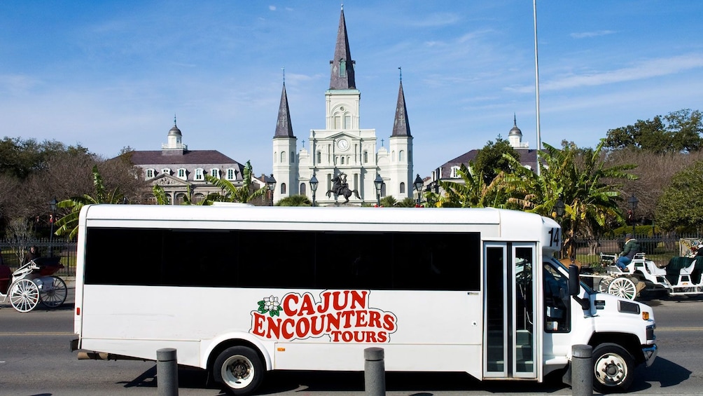 tour bus parked outside St. Louis cathedral in New Orleans