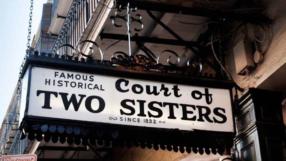 street sign for Court of Two Sisters in New Orleans