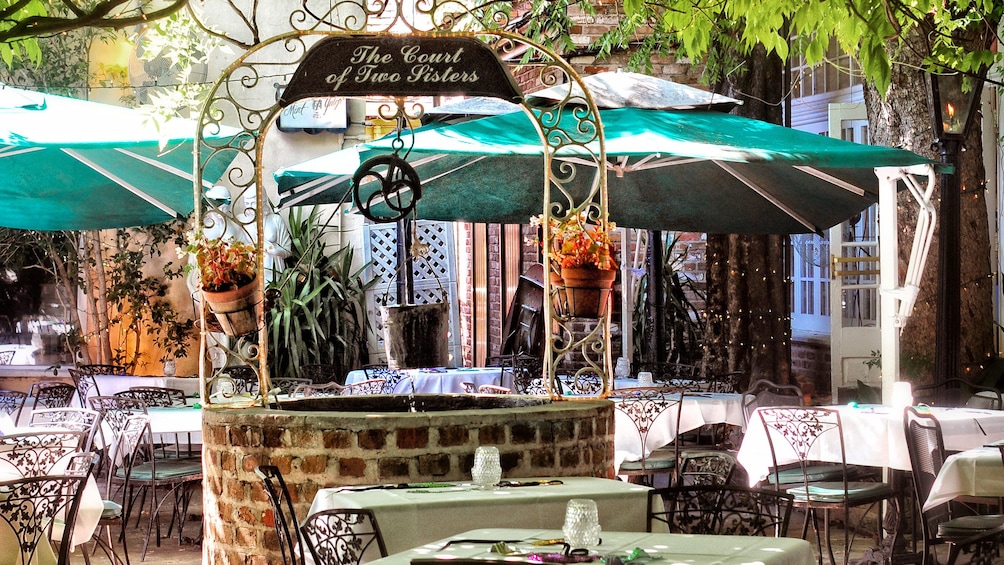 Show item 2 of 5. outdoor terrace dinning at Court of Two Sisters in New Orleans