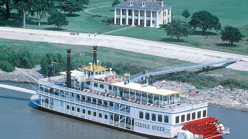 ariel view of paddle boat on river in New Orleans