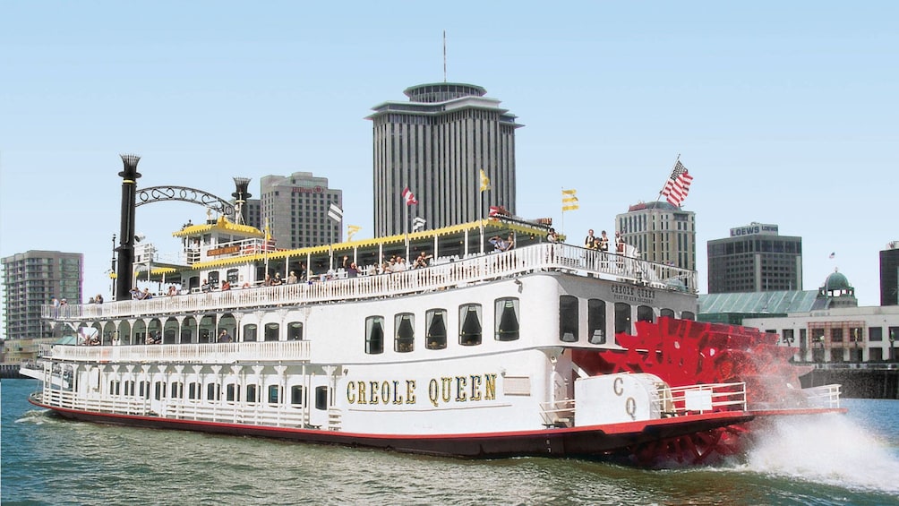 paddle boat churning river water in New Orleans