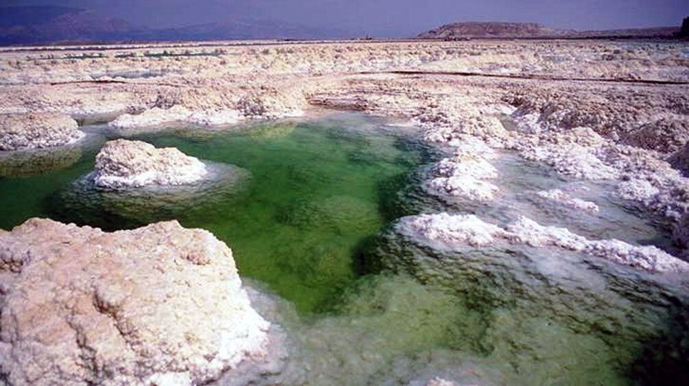 Salt covered rock formations in the dead sea