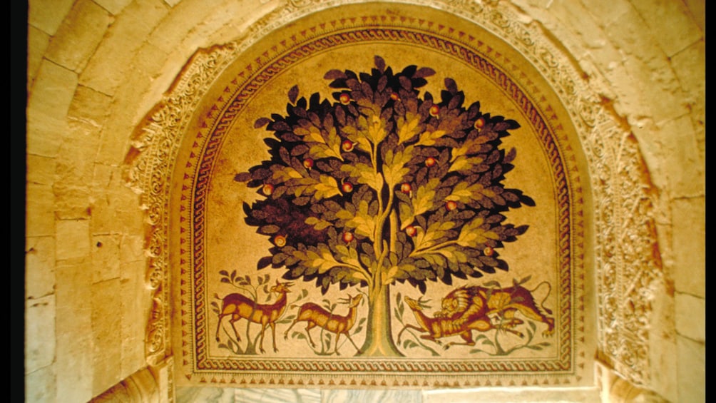 A tile mosaic depicting deer and a tree in Bethlehem 