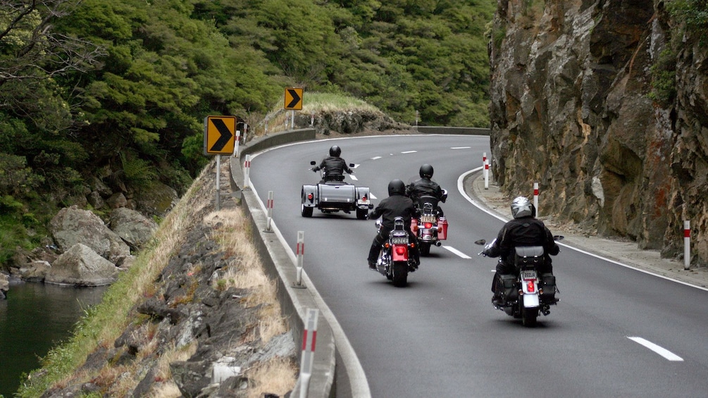 Harley riders on a mountain-side road in Auckland