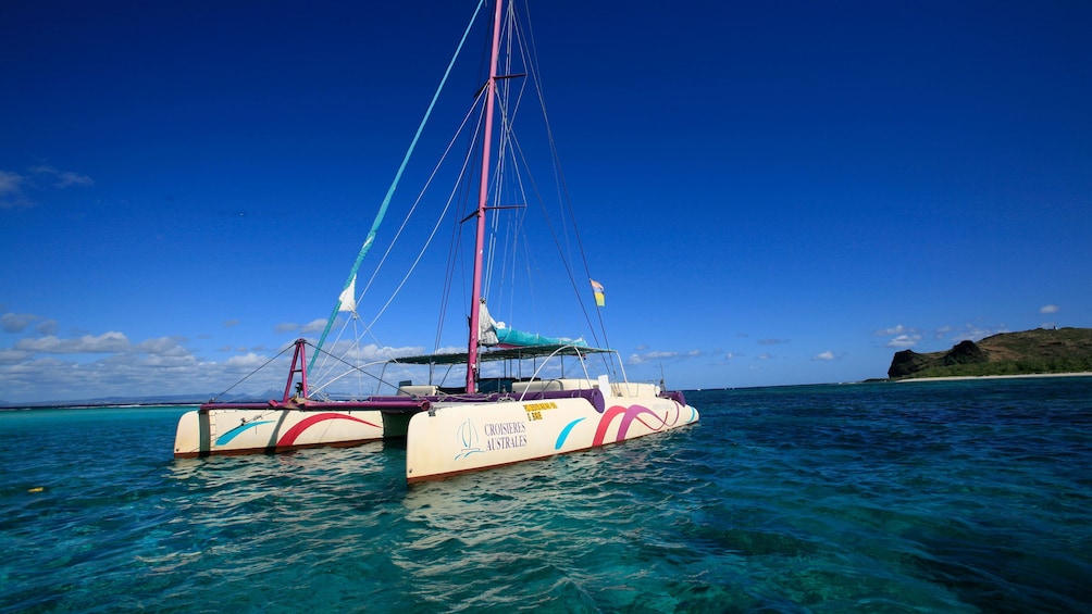 catamaran with the sails down at the Northern Islands