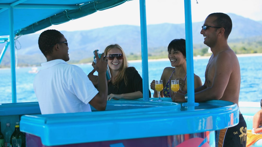 enjoying beverages aboard the cruise at the Northern Islands