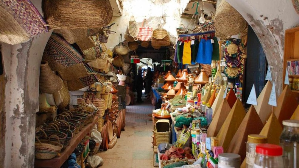 Baskets and other goods for sale at a market in Essaouira