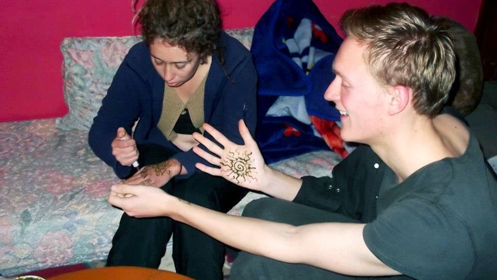 Traditional henna hand tattooing in Agadir