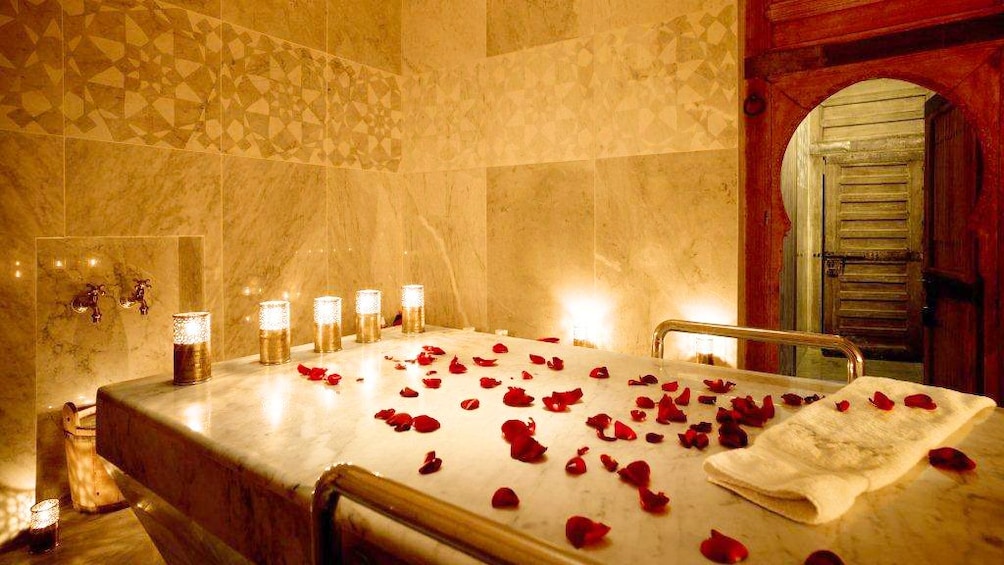 Rose petals covering a table at a spa in Morocco