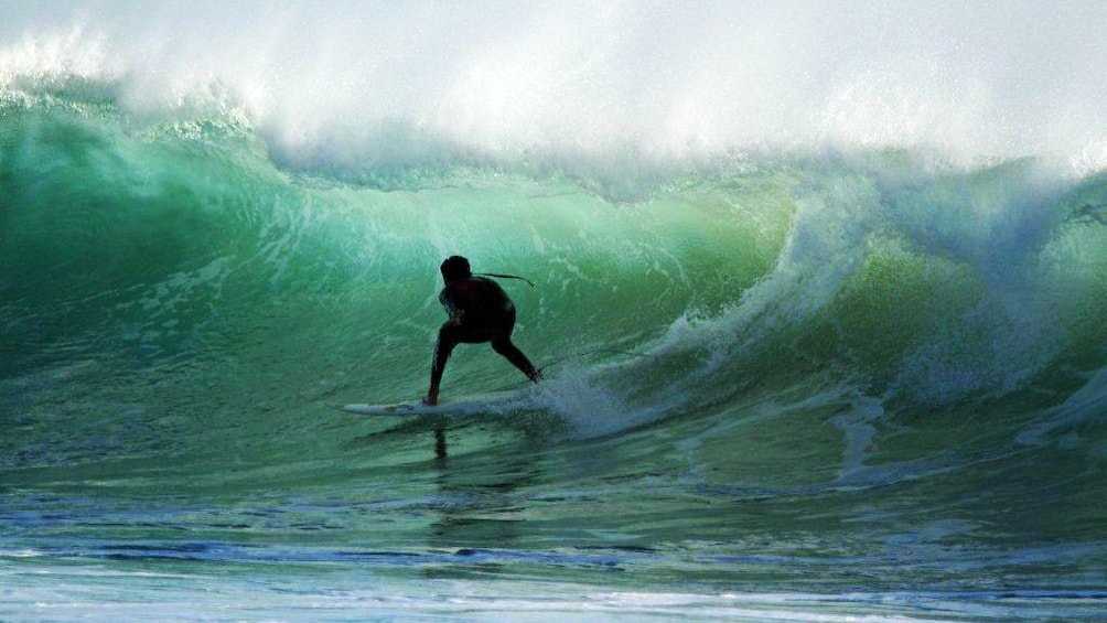 Surfer in the curl of a wave in Agadir