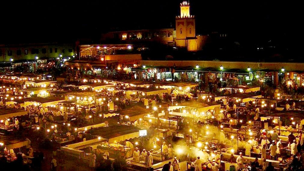 Marrakech market lit up at night