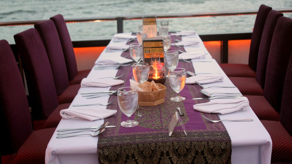 Table setting for a dinner cruise in bangkok