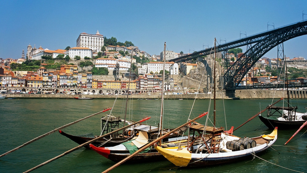 small boats near the Dom Luís I Bridge in Porto City