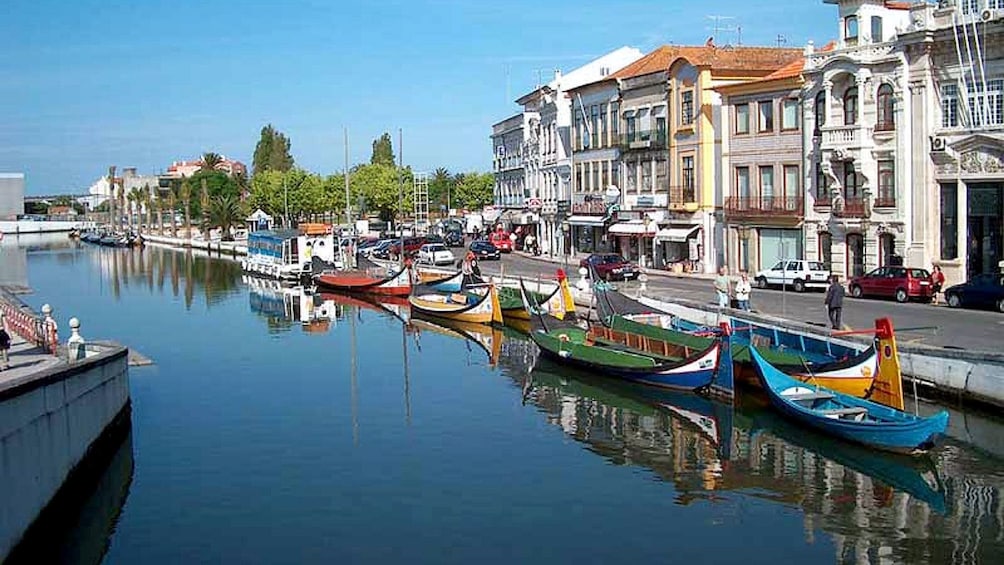 gondolas docked on the side of water channels in Portugal